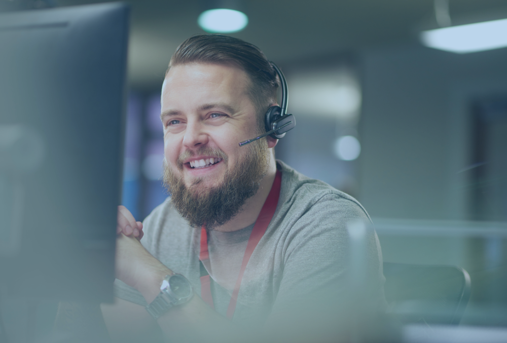 A smailing customer service specialist answers questions